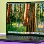 MacBook Pro 14-inch (2024, M4) shown open on a table