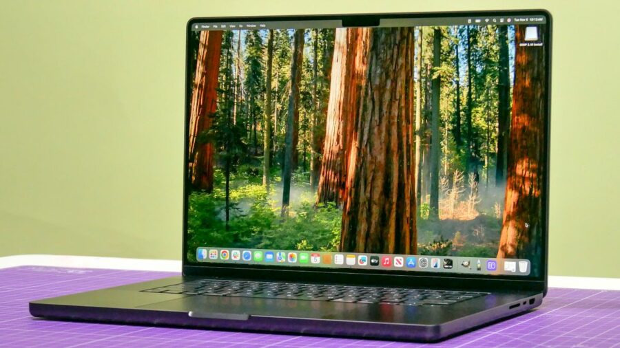 MacBook Pro 14-inch (2024, M4) shown open on a table