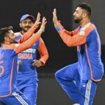 Varun Vinod of India celebrates the wicket of Ryan Rickelton of South Africa ahead of the 2nd T20 match between South Africa and India