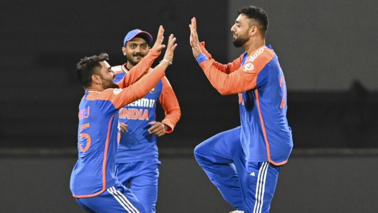 Varun Vinod of India celebrates the wicket of Ryan Rickelton of South Africa ahead of the 2nd T20 match between South Africa and India