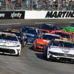 Denny Hamlin and Ryan Blaney lead the field at the Nascar Cup Series Xfinity 500 at Martinsville Speedway in November 2024.