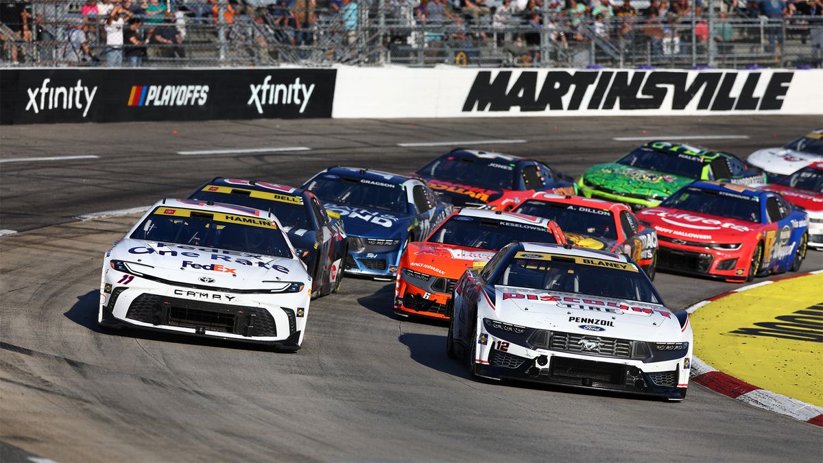 Denny Hamlin and Ryan Blaney lead the field at the Nascar Cup Series Xfinity 500 at Martinsville Speedway in November 2024.