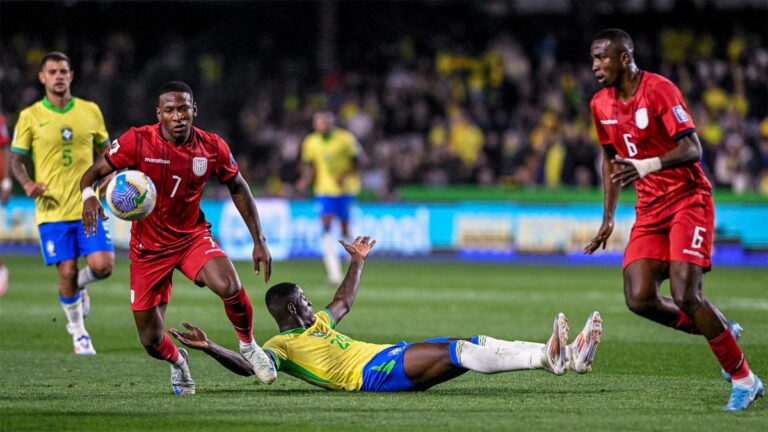 Ecuador's Pervis Estupiñán runs with the ball in a World Cup qualifier against Brazil in 2024.