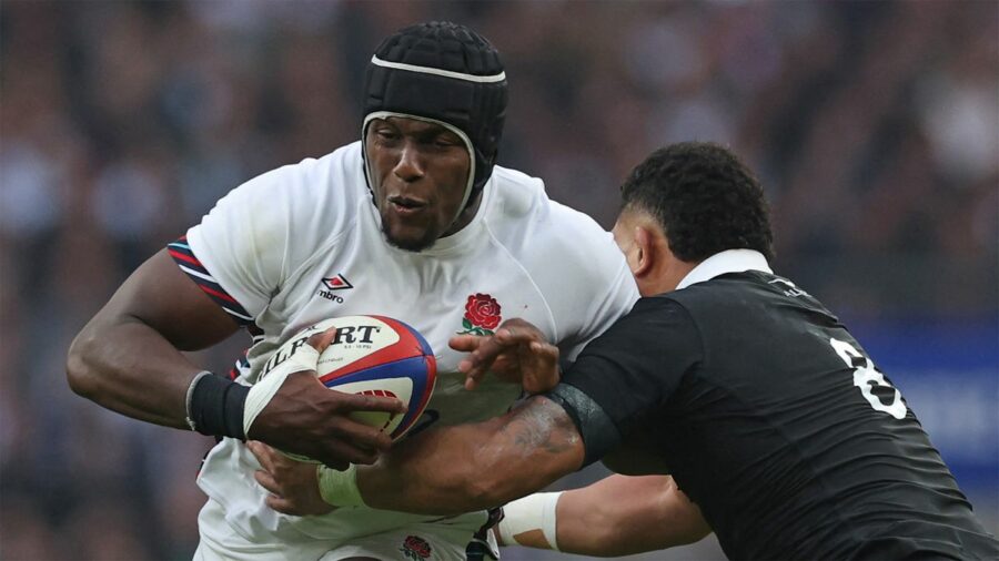 England's Maro Itoje is tackled by New Zealand's Ardie Savea during the teams' November 2024 match.