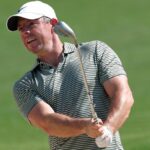 Rory McIlroy plays from a bunker at Yas Links ahead of the The Abu Dhabi Championship 2024 live stream