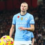 Erling Haaland of Manchester City pulls a face as the ball bounces out of play prior to the Sporting vs Man City Champions League clash.