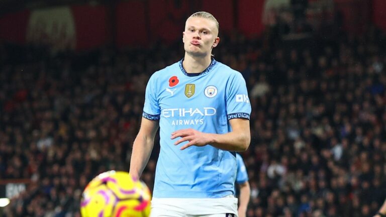 Erling Haaland of Manchester City pulls a face as the ball bounces out of play prior to the Sporting vs Man City Champions League clash.