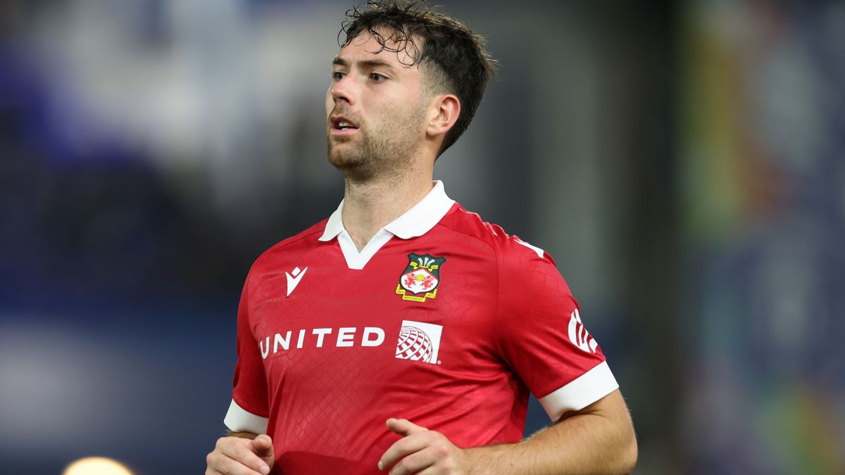 Thomas O'Connor of Wrexham AFC runs the pitch prior to the Harrogate Town vs Wrexham live stream in the FA Cup 2024