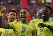 Brazil's forward #10 Raphinha celebrates with teammates forward #20 Savinho and forward #07 Vinicius Jr after scoring during the 2026 FIFA World Cup South American qualifiers going into the Brazil vs Uruguay live stream