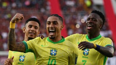 Brazil's forward #10 Raphinha celebrates with teammates forward #20 Savinho and forward #07 Vinicius Jr after scoring during the 2026 FIFA World Cup South American qualifiers going into the Brazil vs Uruguay live stream