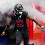 Nico Collins #12 of the Houston Texans takes the field during the game against the Buffalo Bills at NRG Stadium on October 06, 2024 in Houston, Texas